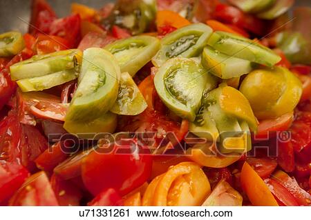 Close up of sliced tomatoes View Large Photo Image Stock Image - Close up of sliced tomatoes. Fotosearch