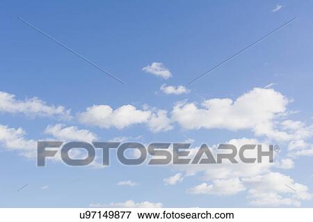 Stock Photo - Clouds on blue sky. Fotosearch