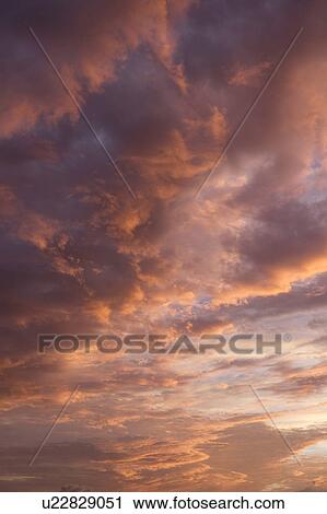 Cloudscape at sunset View Large Photo Image Stock Image - Cloudscape at sunset. Fotosearch