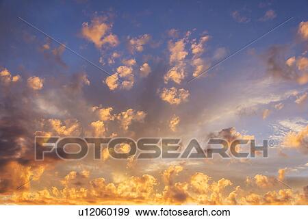 Cloudscape at sunset View Large Photo Image Stock Photo - Cloudscape at sunset. Fotosearch