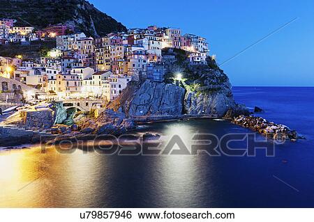 Coastal town at night View Large Photo Image Stock Photograph - Coastal town at night. Fotosearch