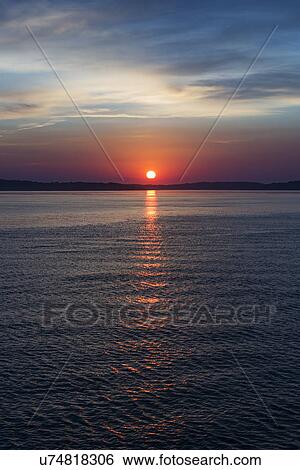 Colorful seascape at sunrise View Large Photo Image Stock Photograph - Colorful seascape at sunrise. Fotosearch