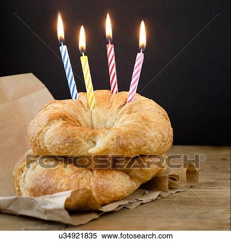Croissants with birthday candles View Large Photo Image Stock Photography - Croissants with birthday candles. Fotosearch