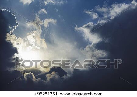 Dramatic sky, clouds and sun trying to break through View Large Photo Image Stock Image - Dramatic sky, clouds and sun trying to break through. Fotosearch