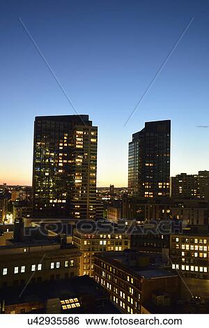 Dusk lights over cityscape View Large Photo Image Stock Photograph - Dusk lights over cityscape. Fotosearch