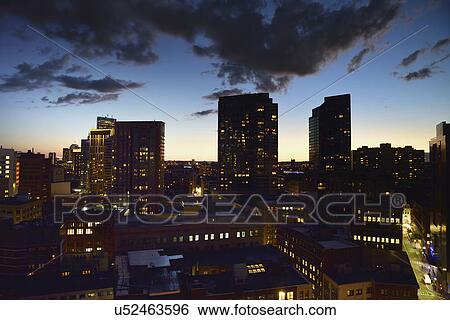 Dusk lights over cityscape View Large Photo Image Stock Photograph - Dusk lights over cityscape. Fotosearch