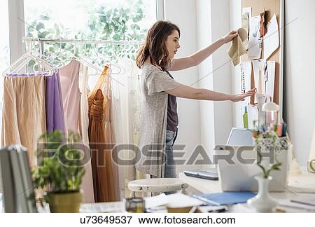 Female fashion designer in her office View Large Photo Image Stock Photo - Female fashion designer in her office. Fotosearch