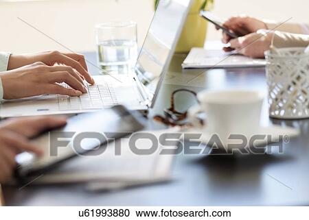 Hands using tablet pc, laptop and smart phone View Large Photo Image Stock Image - Hands using tablet pc, laptop and smart phone. Fotosearch