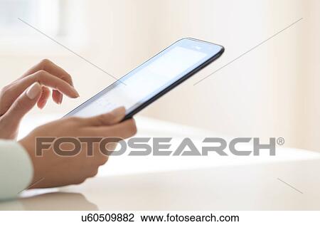 Hands using tablet pc View Large Photo Image Stock Image - Hands using tablet pc. Fotosearch