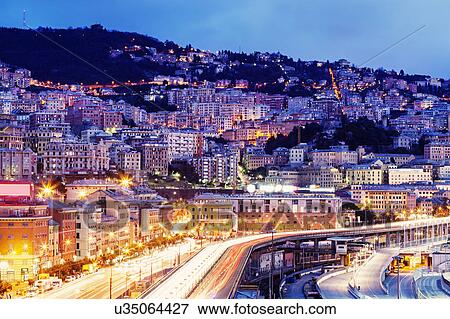 Highway along illuminated city View Large Photo Image Stock Photo - Highway along illuminated city. Fotosearch