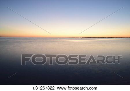 Horizon over water at dusk View Large Photo Image Stock Image - Horizon over water at dusk. Fotosearch