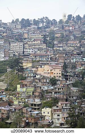 Stock Image - Houses on hill. Fotosearch
