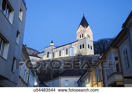 Picture - Illuminated church at dusk. Fotosearch