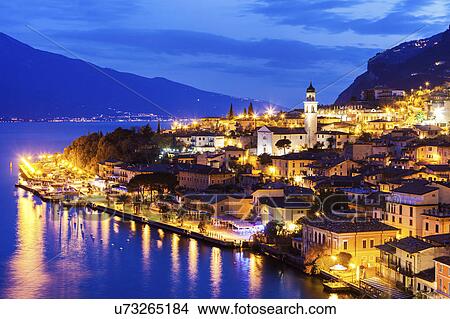 Illuminated cityscape at dusk View Large Photo Image Picture - Illuminated cityscape at dusk. Fotosearch