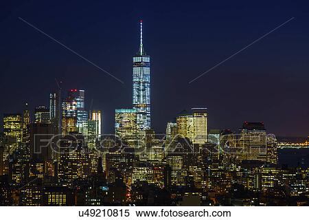 Illuminated cityscape with One world trade center at night View Large Photo Image Stock Photography - Illuminated cityscape with One world trade center at night. Fotosearch