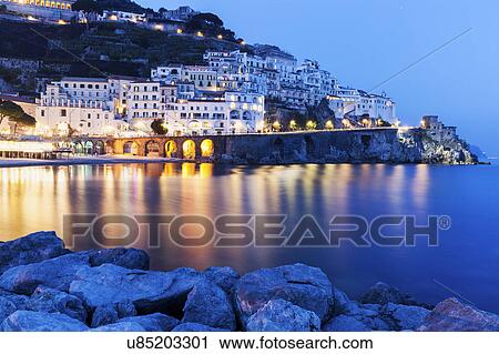 Illuminated town at night View Large Photo Image Stock Image - Illuminated town at night. Fotosearch