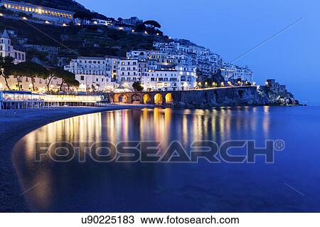 Illuminated town at night View Large Photo Image Stock Image - Illuminated town at night. Fotosearch