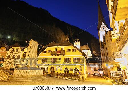 Illuminated town at night View Large Photo Image Stock Photo - Illuminated town at night. Fotosearch