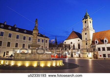 Illuminated town square at dusk View Large Photo Image Stock Image - Illuminated town square at dusk. Fotosearch
