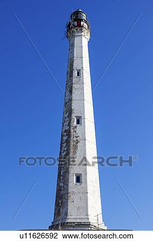 Low angle view of Punta Penna Lighthouse View Large Photo Image Stock Image - Low angle view of Punta Penna Lighthouse. Fotosearch