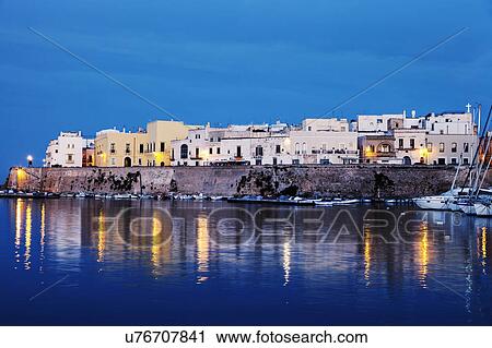 Marina and Castello Angiono at sunrise View Large Photo Image Stock Image - Marina and Castello Angiono at sunrise. Fotosearch
