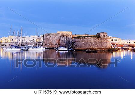 Marina and Castello Angiono at sunrise View Large Photo Image Stock Photo - Marina and Castello Angiono at sunrise. Fotosearch
