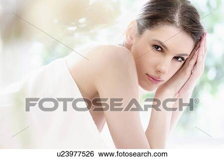 Portrait of beautiful woman in spa View Large Photo Image Stock Photograph - Portrait of beautiful woman in spa. Fotosearch