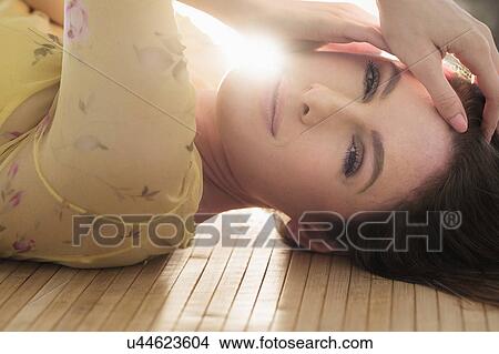 Portrait of beautiful woman with brown hair View Large Photo Image Picture - Portrait of beautiful woman with brown hair. Fotosearch