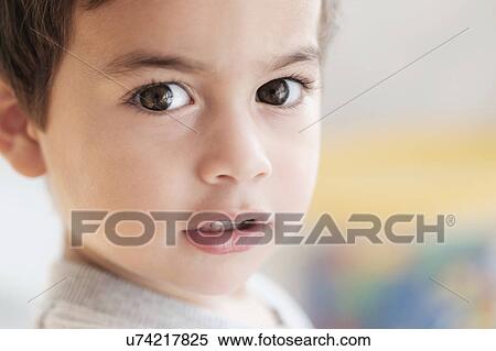 Stock Photography - Portrait of boy (2-3) looking at camera. Fotosearch