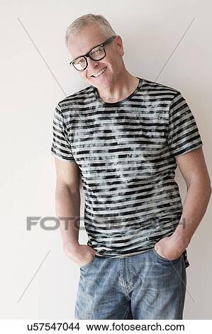 Portrait of cool man against white View Large Photo Image Picture - Portrait of cool man against white. Fotosearch