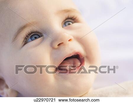 Portrait of laughing baby boy (6-11 months) View Large Photo Image Stock Image - Portrait of laughing baby boy (6-11 months). Fotosearch