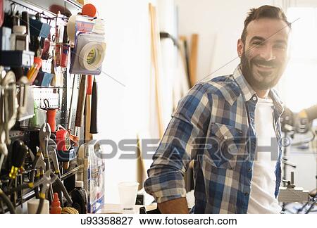 Portrait of man in workshop View Large Photo Image Stock Photo - Portrait of man in workshop. Fotosearch