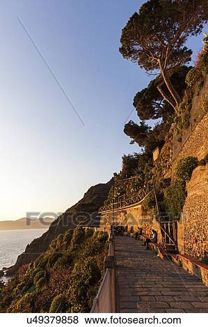 Stock Photo - Promenade at sunset. Fotosearch