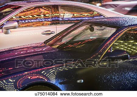 Picture - Reflection in car at night. Fotosearch