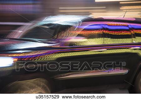 Reflection in car at night View Large Photo Image Stock Photo - Reflection in car at night. Fotosearch