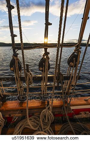 Ropes on sailboat against sunset sky View Large Photo Image Stock Photo - Ropes on sailboat against sunset sky. Fotosearch