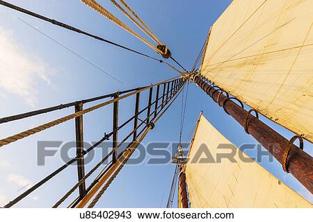 Sail and mast against clear sky View Large Photo Image Stock Image - Sail and mast against clear sky. Fotosearch