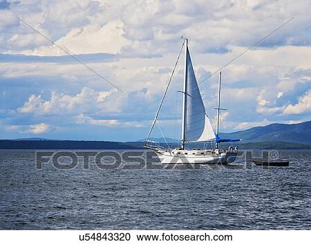 Sailboat in sea View Large Photo Image Stock Image - Sailboat in sea. Fotosearch
