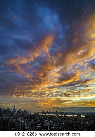 Stock Photography - Scenic cloudscape at sunset. Fotosearch