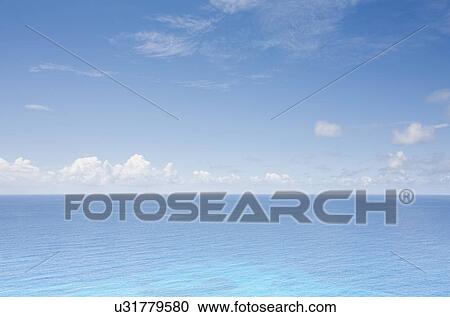 Stock Image - Scenic seascape and cloudy sky. Fotosearch