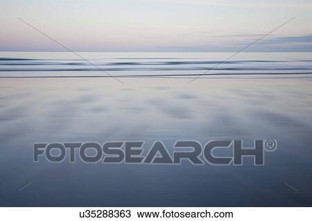 Scenic seascape at dusk View Large Photo Image Stock Image - Scenic seascape at dusk. Fotosearch
