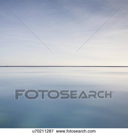 Stock Photo - Scenic view of calm sea. Fotosearch