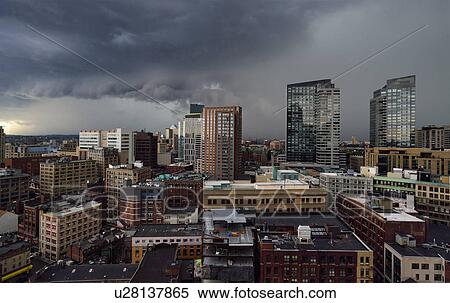 Storm clouds over city View Large Photo Image Stock Photography - Storm clouds over city. Fotosearch