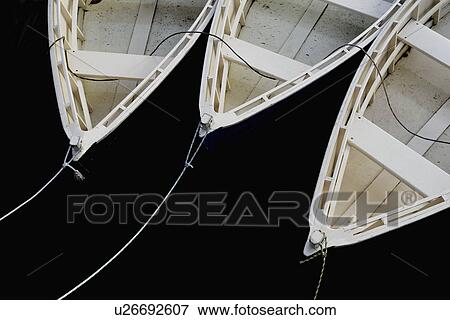 Stock Photo - Three small rowboats. Fotosearch