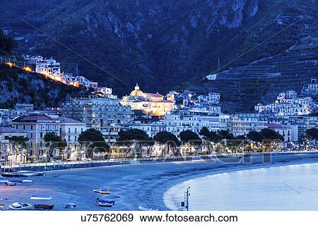 Town and beach at dusk View Large Photo Image Stock Photo - Town and beach at dusk. Fotosearch