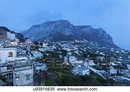 Stock Photo - Town at dusk. Fotosearch
