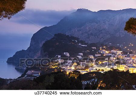 Town at dusk View Large Photo Image Stock Photography - Town at dusk. Fotosearch