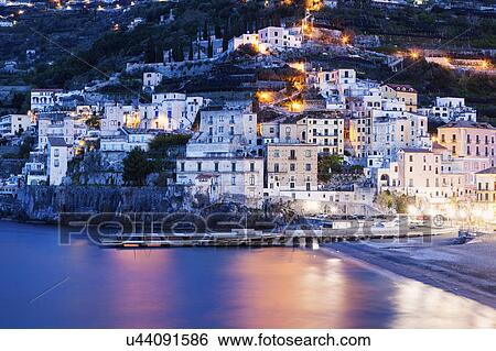 Stock Photograph - Town at sunrise. Fotosearch