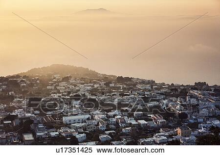 Stock Photography - Town at sunset. Fotosearch