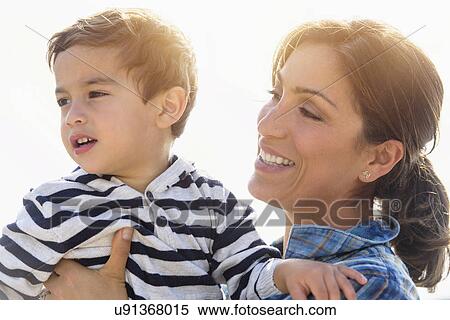 Woman playing with son (2-3) View Large Photo Image Stock Photography - Woman playing with son (2-3). Fotosearch